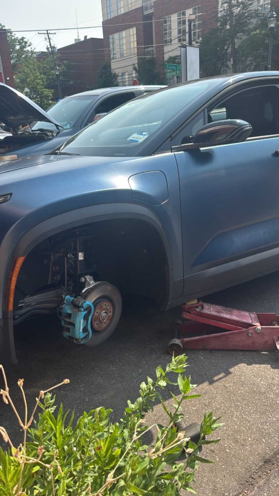 Fisker Ocean tire rotation service with wheel removed
